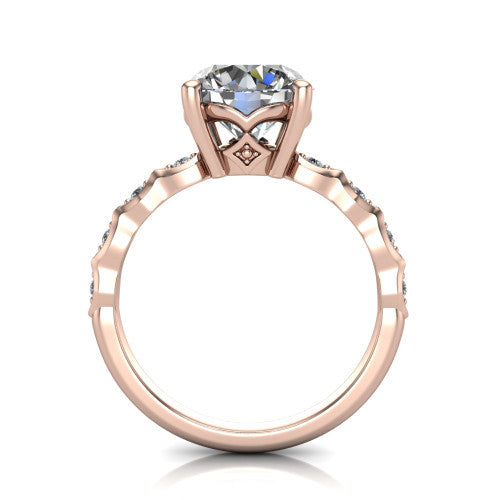 Cassie round vintage station engagement ring in 14K Rose Gold with marquise milgrain band and bezel accents, through-finger front profile showing the filigree bow gallery
