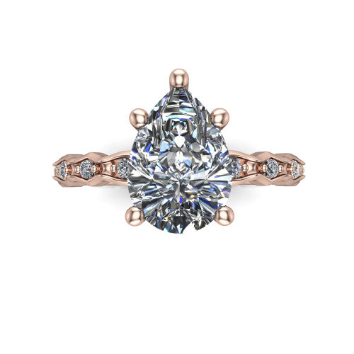 Cassie pear vintage station engagement ring in 18K Rose Gold with marquise milgrain band and bezel accents, top-down view of the four-prong center and station band