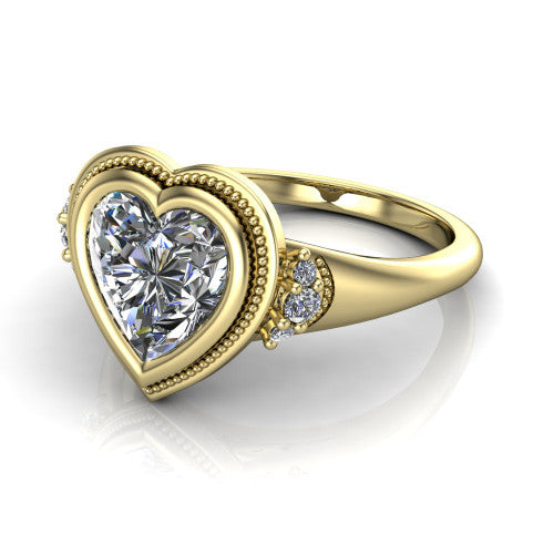 Elliana heart bezel-set solitaire engagement ring in 18K Yellow Gold with squared milgrain bezel and pavé shoulders, three-quarter perspective view