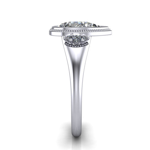 Elliana pear bezel-set solitaire engagement ring in Platinum with squared milgrain bezel and pavé shoulders, side profile showing the milgrain bezel and split gallery