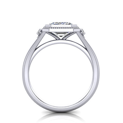 Elliana emerald bezel-set solitaire engagement ring in 18K White Gold with squared milgrain bezel and pavé shoulders, through-finger front profile