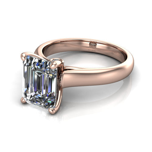 Brielle emerald solitaire engagement ring in 14K Rose Gold with plain band and peek-a-boo accent, three-quarter perspective view