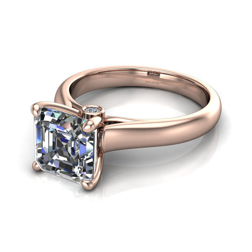 Brielle asscher solitaire engagement ring in 14K Rose Gold with plain band and peek-a-boo accent, three-quarter perspective view
