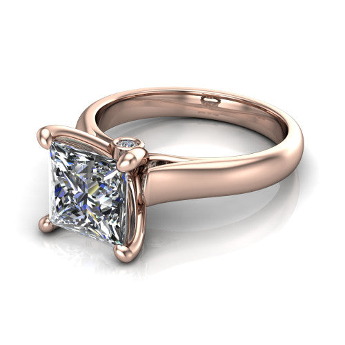 Brielle princess solitaire engagement ring in 14K Rose Gold with plain band and peek-a-boo accent, three-quarter perspective view