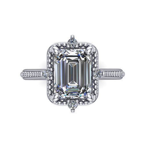 Esther emerald vintage halo engagement ring in 18K White Gold with squared milgrain halo and corner points, top-down view of the squared halo and corner points