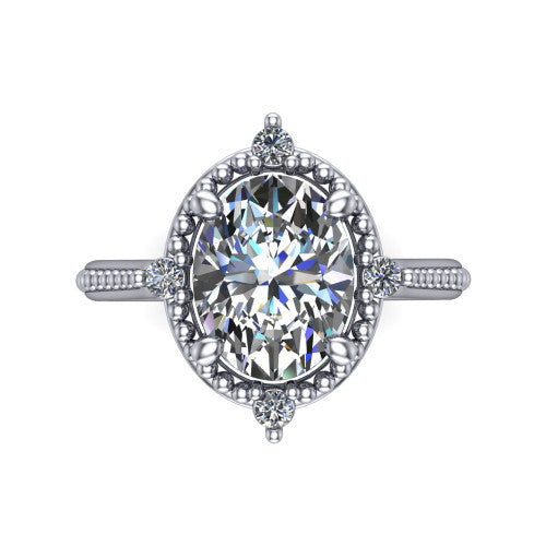 Esther oval vintage halo engagement ring in Platinum with squared milgrain halo and corner points, top-down view of the squared halo and corner points