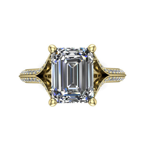 Cecilia emerald split shank engagement ring in 14K Yellow Gold with micro-pavé band, top-down view of the four-prong center and pavé split shank