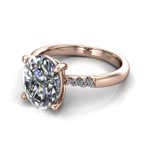Rebecca oval solitaire engagement ring in 14K Rose Gold with pavé shoulder accents, three-quarter perspective view