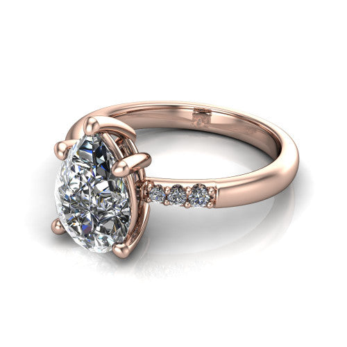 Rebecca pear solitaire engagement ring in 14K Rose Gold with pavé shoulder accents, three-quarter perspective view