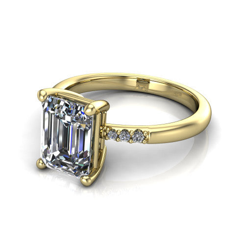 Rebecca emerald solitaire engagement ring in 18K Yellow Gold with pavé shoulder accents, three-quarter perspective view