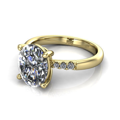 Rebecca oval solitaire engagement ring in 18K Yellow Gold with pavé shoulder accents, three-quarter perspective view
