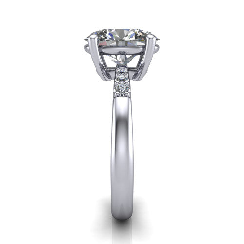 Rebecca oval solitaire engagement ring in 14K White Gold with pavé shoulder accents, side profile showing the pavé shoulders and plain band