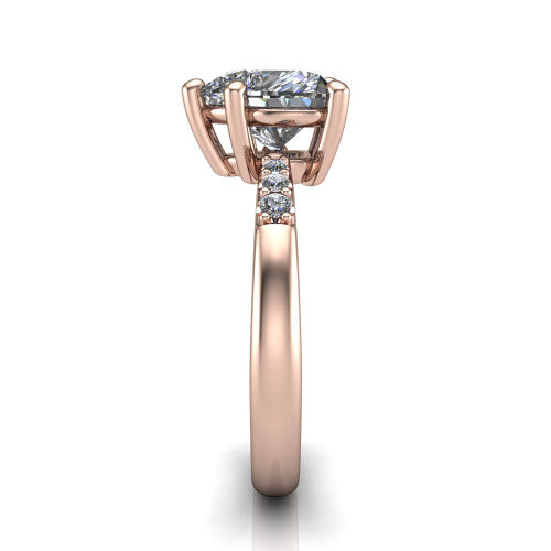 Rebecca heart solitaire engagement ring in 14K Rose Gold with pavé shoulder accents, side profile showing the pavé shoulders and plain band