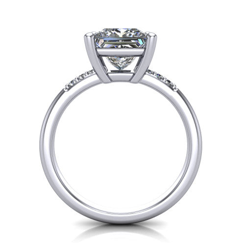 Rebecca princess solitaire engagement ring in 18K White Gold with pavé shoulder accents, through-finger front profile