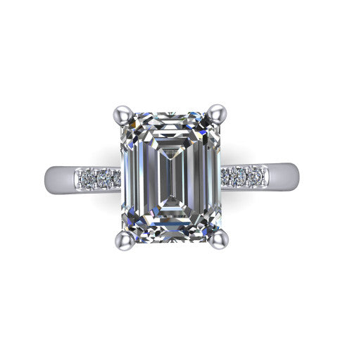 Rebecca emerald solitaire engagement ring in 18K White Gold with pavé shoulder accents, top-down view of the four-prong center and pavé shoulders