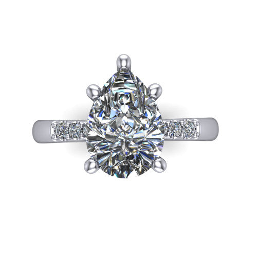 Rebecca pear solitaire engagement ring in Platinum with pavé shoulder accents, top-down view of the four-prong center and pavé shoulders