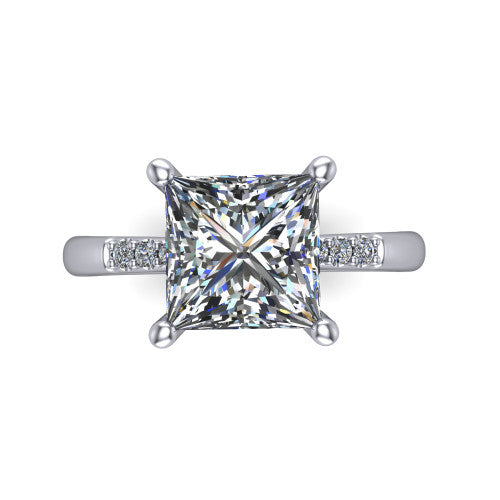 Rebecca princess solitaire engagement ring in Platinum with pavé shoulder accents, top-down view of the four-prong center and pavé shoulders