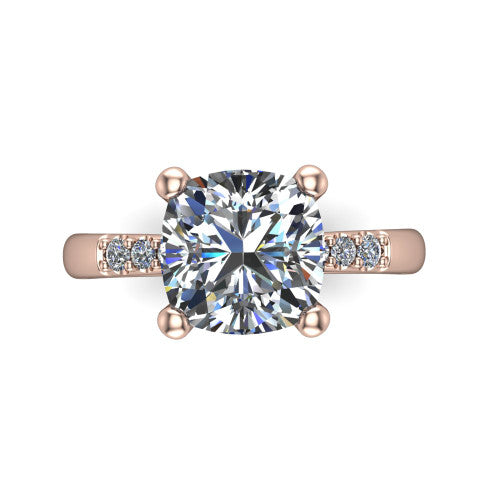 Rebecca cushion solitaire engagement ring in 18K Rose Gold with pavé shoulder accents, top-down view of the four-prong center and pavé shoulders