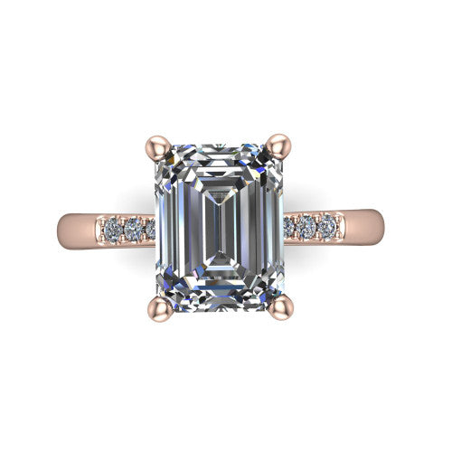 Rebecca emerald solitaire engagement ring in 18K Rose Gold with pavé shoulder accents, top-down view of the four-prong center and pavé shoulders