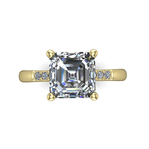 Rebecca asscher solitaire engagement ring in 18K Yellow Gold with pavé shoulder accents, top-down view of the four-prong center and pavé shoulders