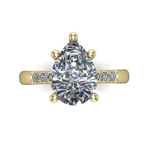 Rebecca pear solitaire engagement ring in 14K Yellow Gold with pavé shoulder accents, top-down view of the four-prong center and pavé shoulders