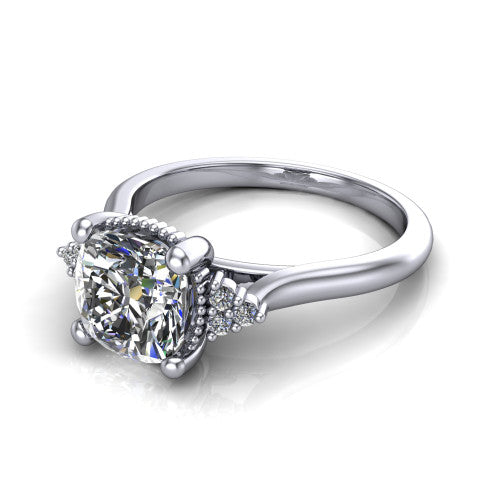 Brianna cushion three stone engagement ring in 14K White Gold with milgrain-framed center and round side clusters, three-quarter perspective view