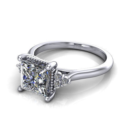 Brianna princess three stone engagement ring in 14K White Gold with milgrain-framed center and round side clusters, three-quarter perspective view