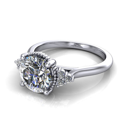 Brianna round three stone engagement ring in 14K White Gold with milgrain-framed center and round side clusters, three-quarter perspective view