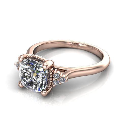Brianna cushion three stone engagement ring in 14K Rose Gold with milgrain-framed center and round side clusters, three-quarter perspective view