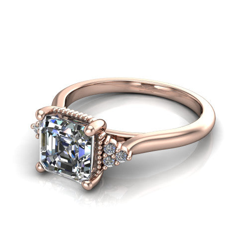 Brianna asscher three stone engagement ring in 18K Rose Gold with milgrain-framed center and round side clusters, three-quarter perspective view
