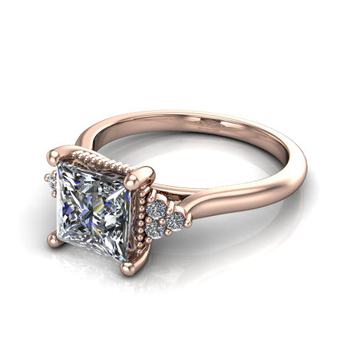 Brianna princess three stone engagement ring in 14K Rose Gold with milgrain-framed center and round side clusters, three-quarter perspective view