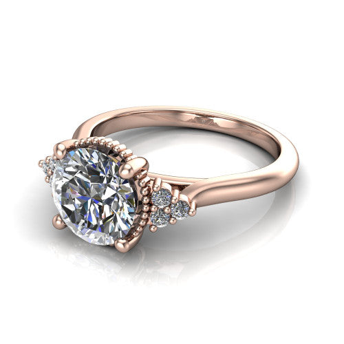 Brianna round three stone engagement ring in 14K Rose Gold with milgrain-framed center and round side clusters, three-quarter perspective view