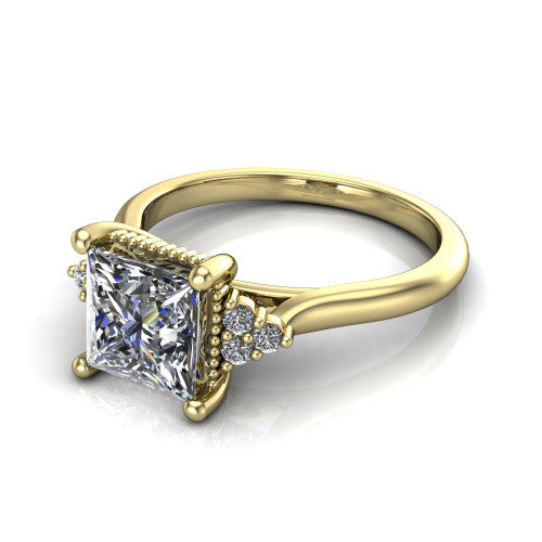 Brianna princess three stone engagement ring in 14K Yellow Gold with milgrain-framed center and round side clusters, three-quarter perspective view