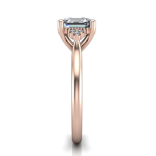 Brianna asscher three stone engagement ring in 14K Rose Gold with milgrain-framed center and round side clusters, side profile showing the plain band and side accent clusters