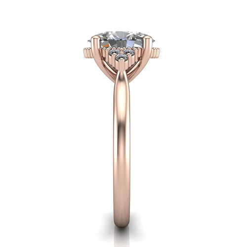 Brianna oval three stone engagement ring in 14K Rose Gold with milgrain-framed center and round side clusters, side profile showing the plain band and side accent clusters