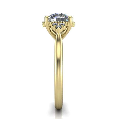 Brianna round three stone engagement ring in 18K Yellow Gold with milgrain-framed center and round side clusters, side profile showing the plain band and side accent clusters