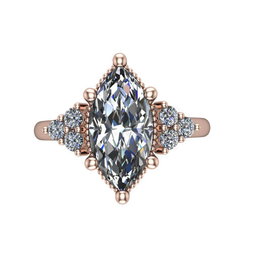 Brianna marquise three stone engagement ring in 18K Rose Gold with milgrain-framed center and round side clusters, top-down view of the milgrain-framed center and side accent clusters