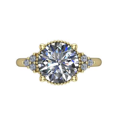 Brianna round three stone engagement ring in 14K Yellow Gold with milgrain-framed center and round side clusters, top-down view of the milgrain-framed center and side accent clusters