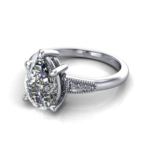Juliette pear pavé solitaire engagement ring in Platinum with milgrain-edged band, three-quarter perspective view