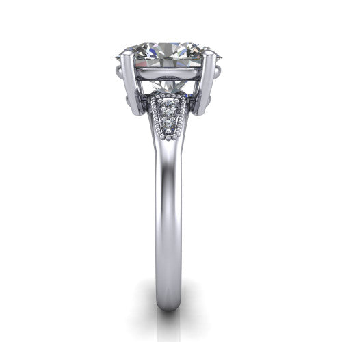 Juliette oval pavé solitaire engagement ring in Platinum with milgrain-edged band, side profile showing the tapered milgrain pavé band