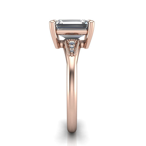 Juliette emerald pavé solitaire engagement ring in 14K Rose Gold with milgrain-edged band, side profile showing the tapered milgrain pavé band