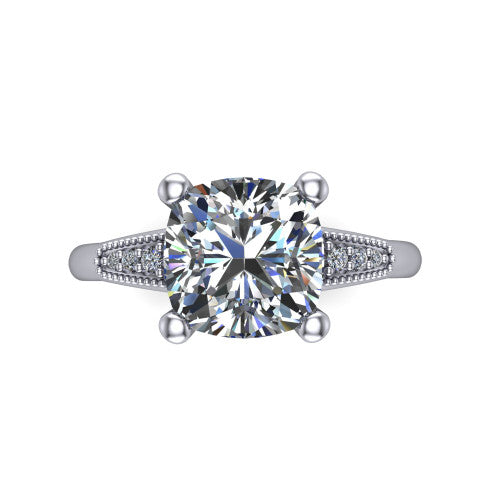 Juliette cushion pavé solitaire engagement ring in 18K White Gold with milgrain-edged band, top-down view of the four-prong center and milgrain pavé band