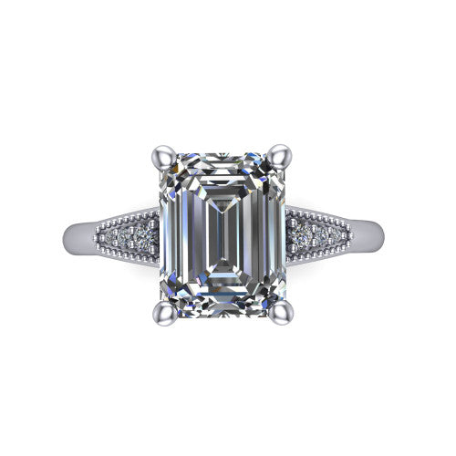 Juliette emerald pavé solitaire engagement ring in 18K White Gold with milgrain-edged band, top-down view of the four-prong center and milgrain pavé band