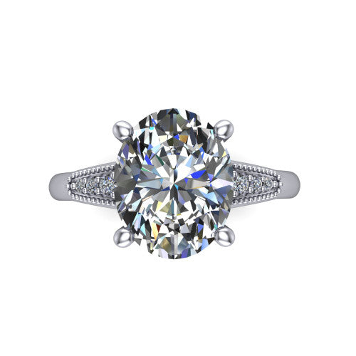 Juliette oval pavé solitaire engagement ring in 18K White Gold with milgrain-edged band, top-down view of the four-prong center and milgrain pavé band