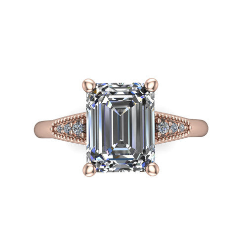 Juliette emerald pavé solitaire engagement ring in 14K Rose Gold with milgrain-edged band, top-down view of the four-prong center and milgrain pavé band