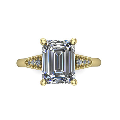 Juliette emerald pavé solitaire engagement ring in 18K Yellow Gold with milgrain-edged band, top-down view of the four-prong center and milgrain pavé band