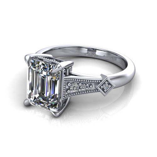 Emerson emerald-cut solitaire engagement ring in 14K White Gold, three-quarter perspective showing the emerald-cut center diamond and kite-set accents on the milgrain band
