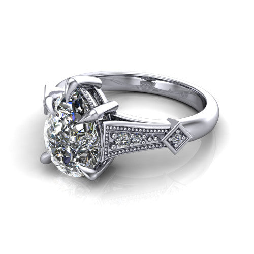 Emerson pear solitaire engagement ring in Platinum, three-quarter perspective showing the pear center diamond and kite-set accents on the milgrain band