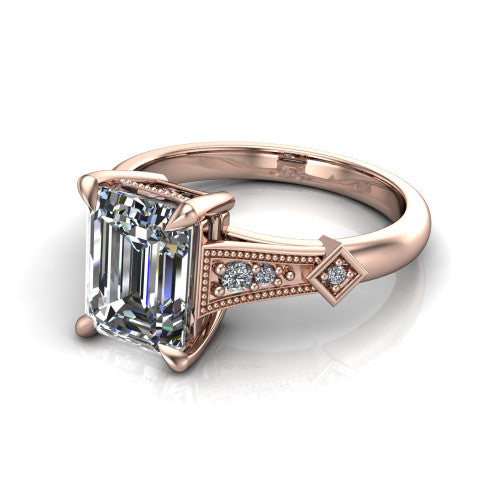 Emerson emerald-cut solitaire engagement ring in 14K Rose Gold, three-quarter perspective showing the emerald-cut center diamond and kite-set accents on the milgrain band