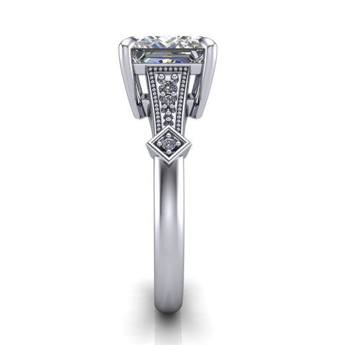 Emerson princess-cut solitaire engagement ring in 18K White Gold, side profile showing the milgrain band, kite accents, and tapered profile in side view